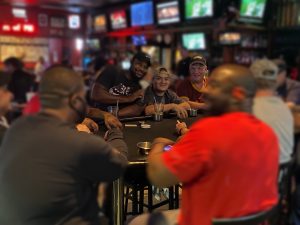people playing poker at cheers sports bar